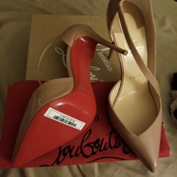 Christian Louboutin Cream “Jumping” Red Bottoms 