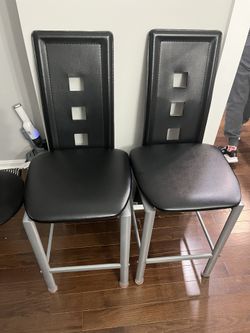 4 Black And Chrome Bar Stools