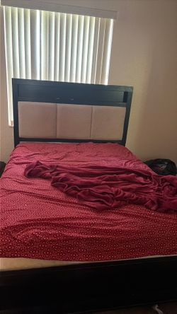 Queen size bed with mattress and box spring