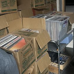 Large lot of Vinyl records and some cassette tapes.