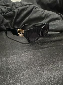 Miu Miu Black Sunglasses with Gold Logo