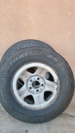 Two tires and rims 215/75 R15