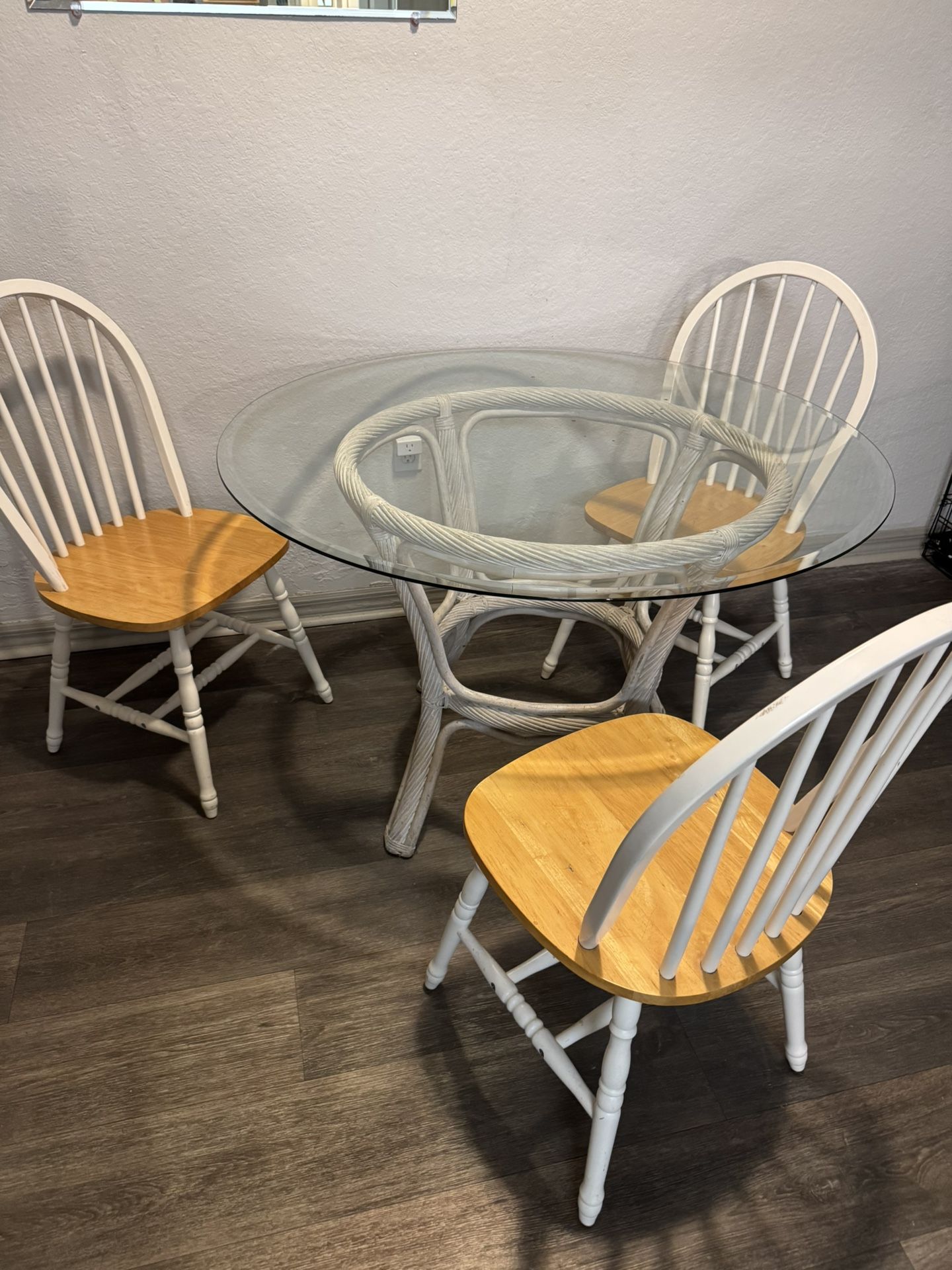 wicker table with glass top and 3 chairs