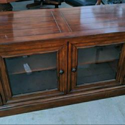 Entertainment center with glass