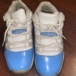 blue and white jordan 11s. size 4