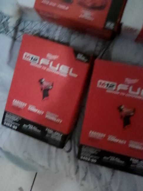 Milwaukee M12 Fuel Impact Drill And 2 Batteries And The Charger