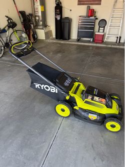 Like new RYOBI EGO battery powered mower.