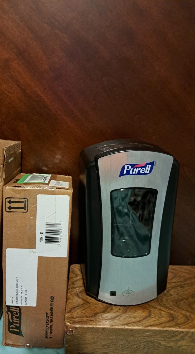 Gojo automatic 1928-01 purell dispencer brand new from Amazon