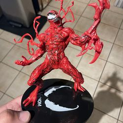 carnage action figure $25 about 7 “ tall in n Lakeland 