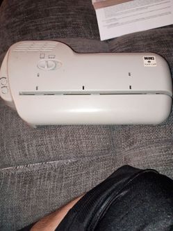 Sparco Electric Three-Hole Punch (Model SPR96003).