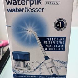 Brand New In box- Waterpik/Waterflosser