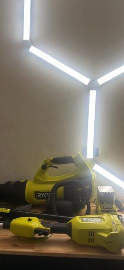 ONE+ HP 18V Brushless Cordless 15 in. String Trimmer & 130 MPH 510 CFM Leaf Blower Combo Kit w/ 4.0 Ah Battery & Charger