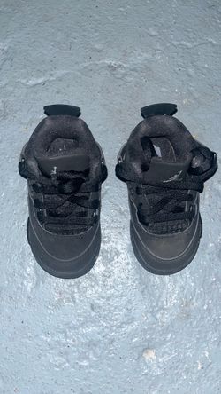 Black cat Jordan 4s