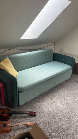 Velvet teal blue pull out couch