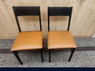 Dining Chairs BFM Seating Dale model featuring a black metal frame and a cushioned seat.