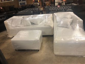 White sectional vinyl with ottoman $699.95