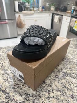 Christian Louboutin “Red Bottoms” Size 11