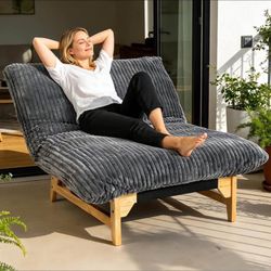 Brand New Grey corduroy chaise lounge chair has an adjustable backrest. This sofa bed is upholstered in a soft ribbed fabric.