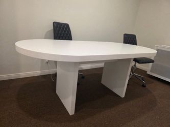 Oval shaped wooden table
