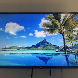 LG 50” 4K UHD Smart TV – Excellent Condition – Wall Mount + Stand Included