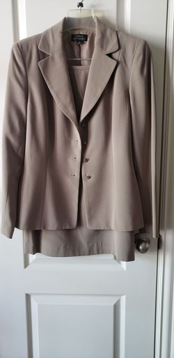 beige Giorgio Sant'Angelo blazer and skirt set.