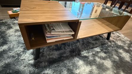 Coffee table with glass top