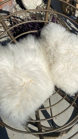 2 fur pillows