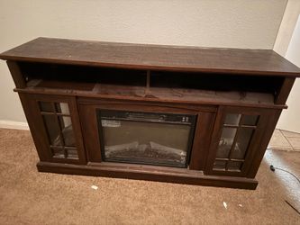 Entertainment center heater & fireplace included  $100