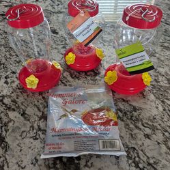 3 hummingbird feeders and 1 bag hummingbird nectar