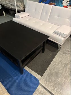 White Faux Leather Sofa Bed & Black Coffee Table