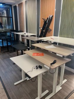 Height, adjustable electric standing desks, largest selection in town I can deliver