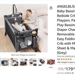Brand New In Box ANGELBLISS 5 in 1 Baby Bassinet, Bedside Crib & Playpen, Pack and Play Bassinet with Diaper Changer and Removable Rocker, Easy Foldin