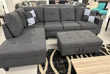 Charcoal gray linen sectional couch and ottoman