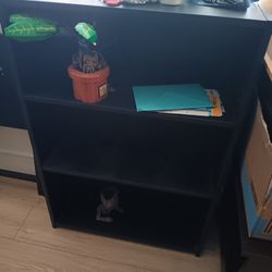 2 black book case shelves
