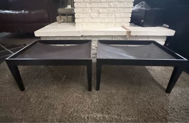 Two black pet beds with elevated design. 24"×20"x 12"