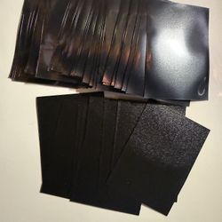 Roughly 60-70 Sleeves For Cards