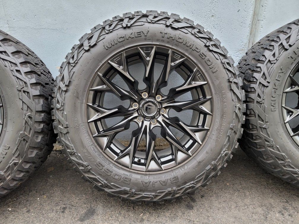 20x10 Fuel Flame w/ 35x12.50 R20 Mickey Thompson Tires for Sale in