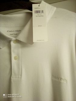 Brand New Calvin Klein Polo style Shirt