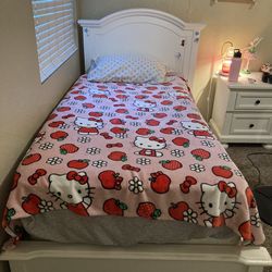 white bed frame and mattress