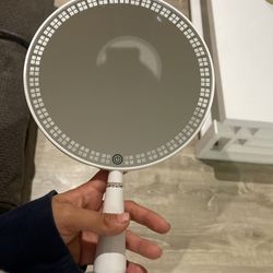 Impressions make up mirror/holder