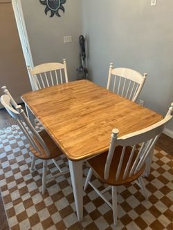 Available 6/23 - Solid wood dining table with 4 chairs
