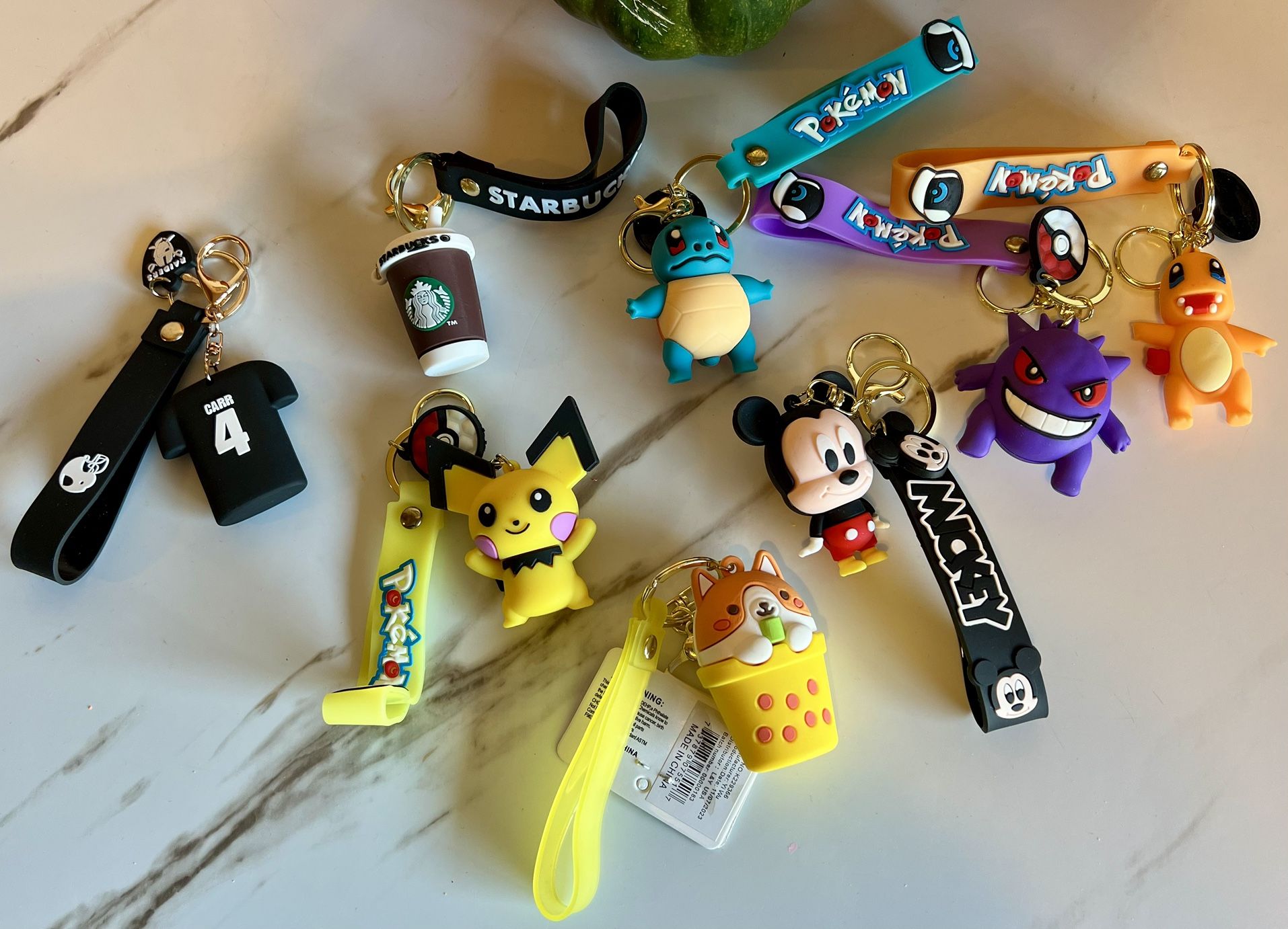 Random Keychains and Psyduck Enamel Pin