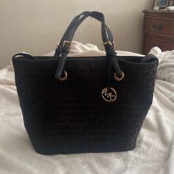 Michael Kors black with gold