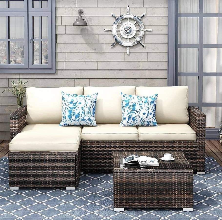 Patio Furniture Set New in Original Packaging With Coffee Table, Cushions and Decorative Cushions.