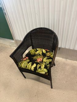 One outdoor wicker chair With Cushion .. $40