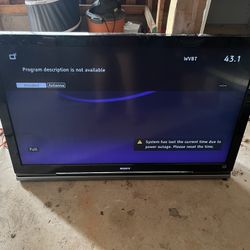 52 in. Sony flatscreen Tv: comes with remote, no stand.