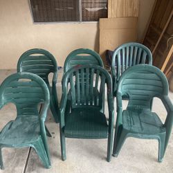 9 Green Plastic Stackable Lawn Chairs