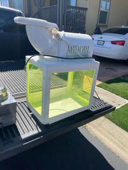 SNO CONE MACHINE AND CHEESE WARMER