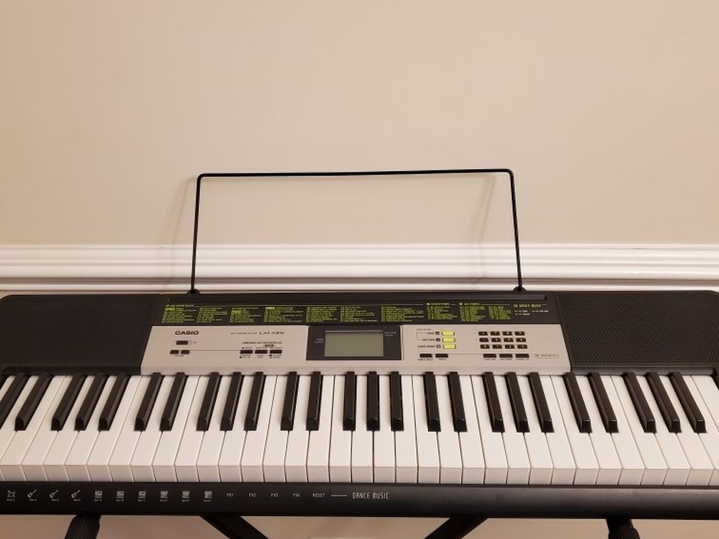 NEW CASIO LK-135 DIGITAL PIANO WITH ACCESSORIES