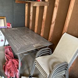 Table, 4 Chairs,  Umbrella And Umbrella Base